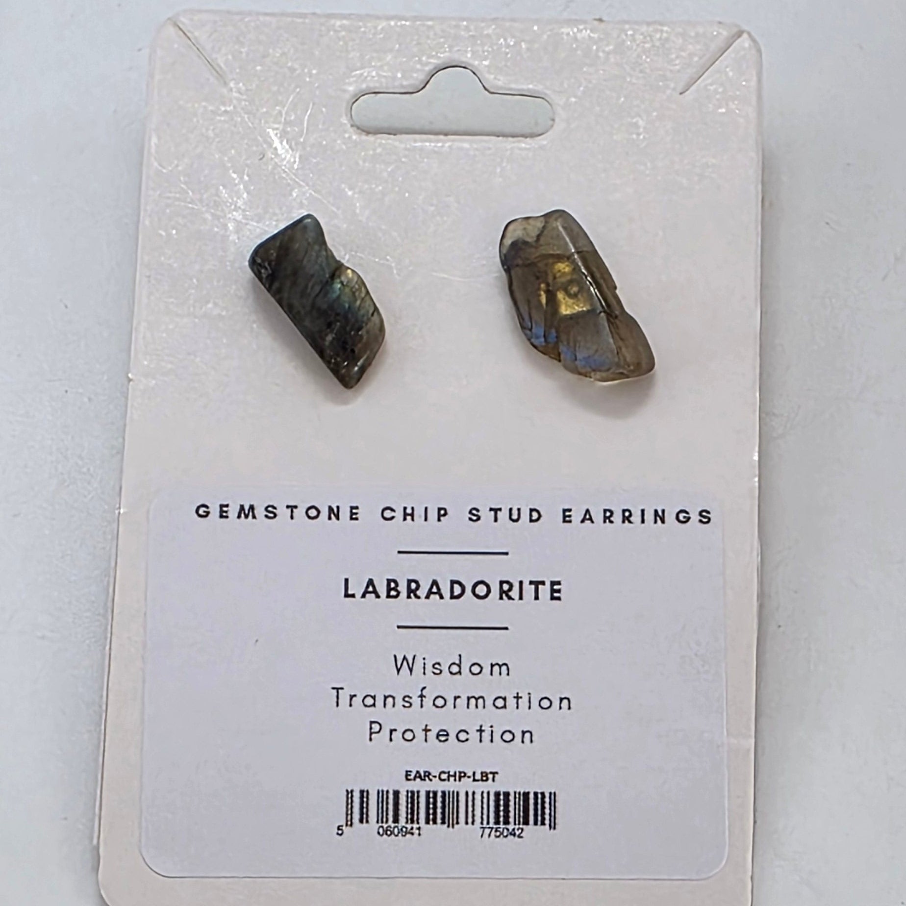 Two labradorite stones on a white card with product details.