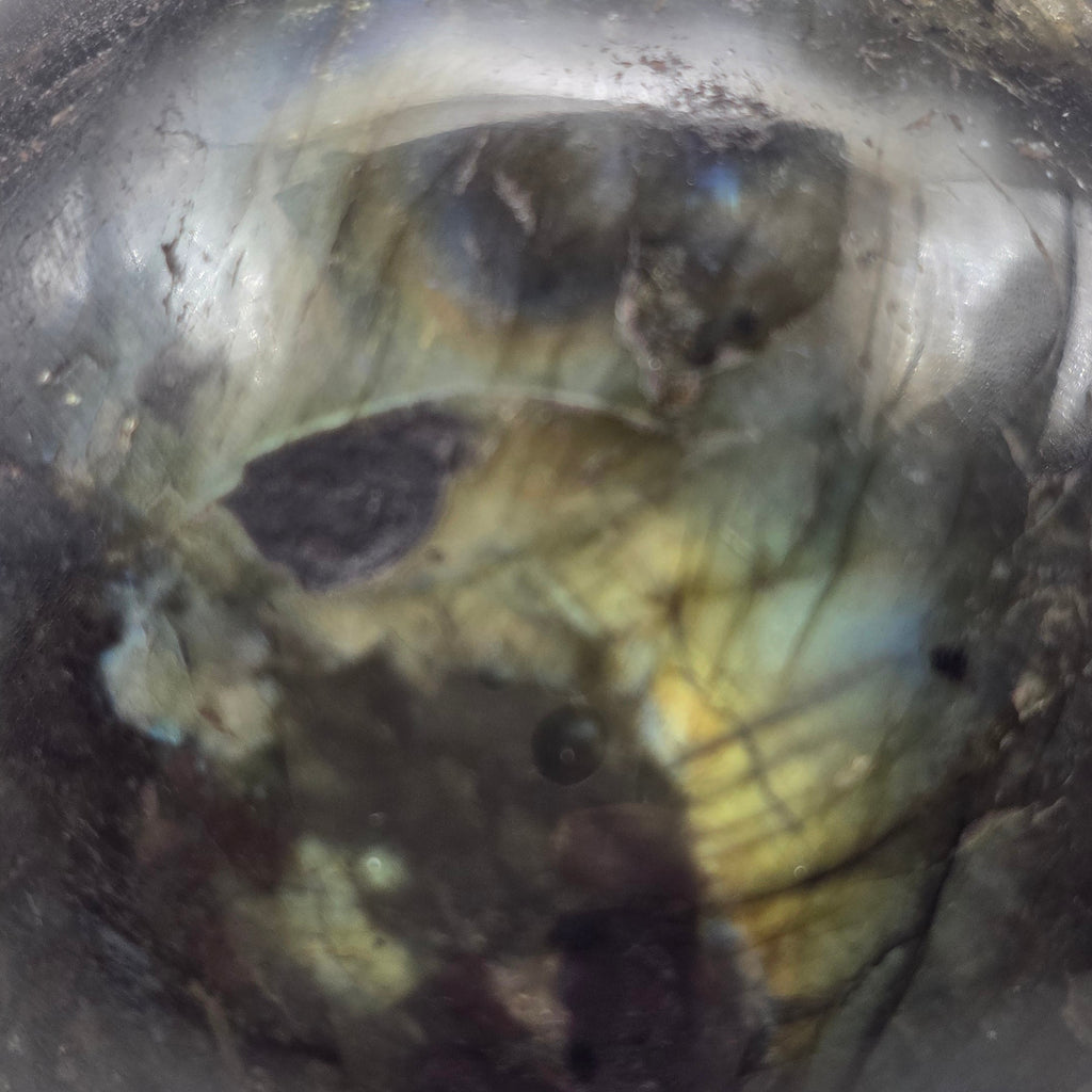 Close-up of a Labradorite shpere with internal inclusions