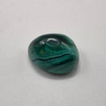 Single Malachite Crystal on a white background