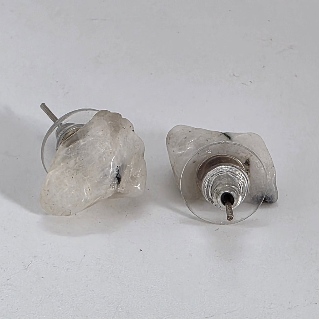 Pair of moonstone earrings on a white background