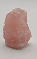 Raw Rose Quartz Crystal in its true formation face on