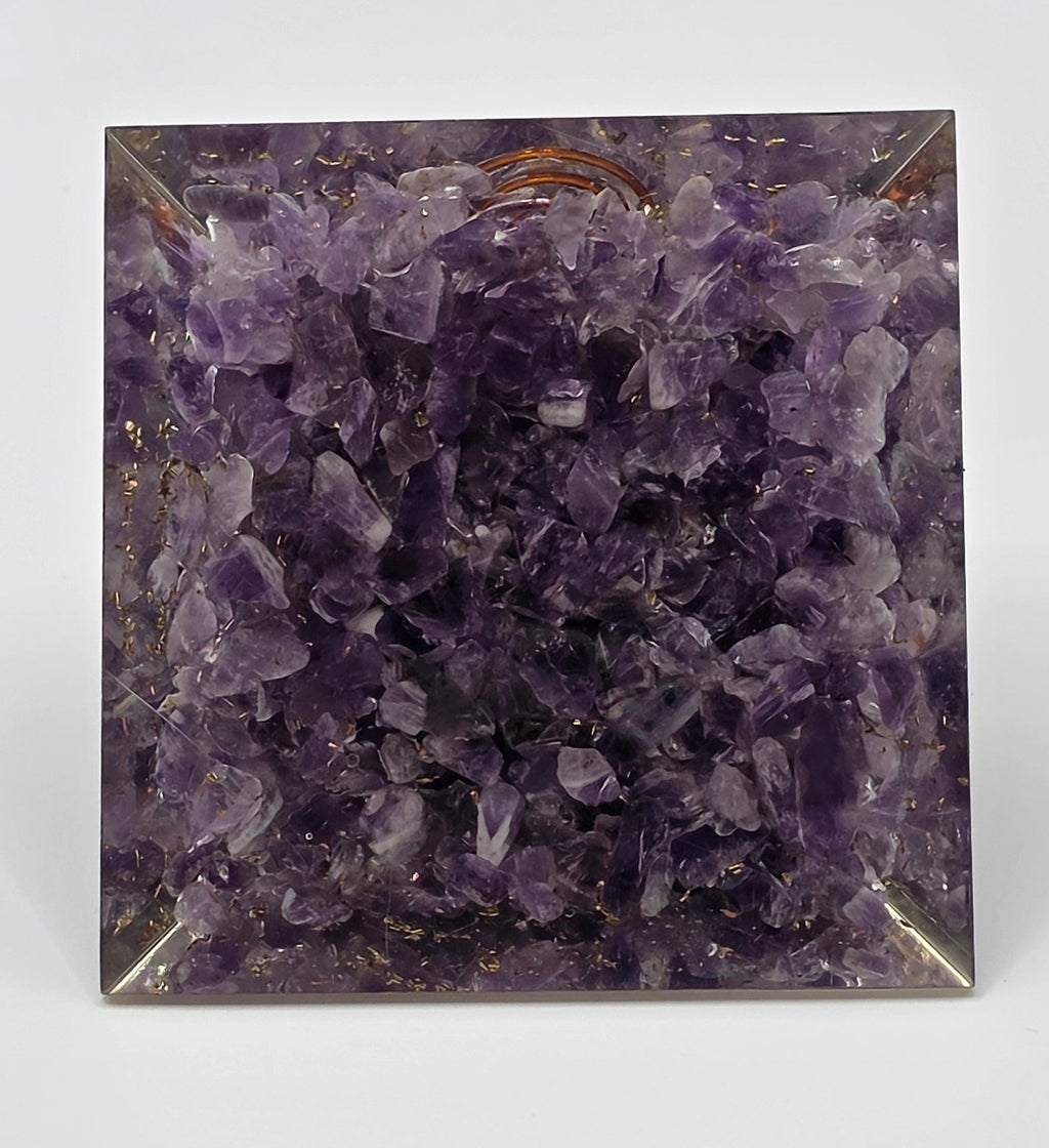 Basw view of amethyst orgonite pyramid 60mm showing the bottom layer of the amethyst chips
