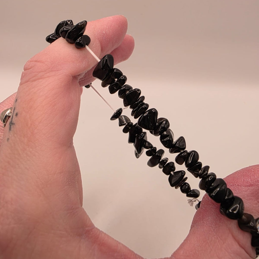 Close up showing double strung elastic construction – two strands for extra durability and security