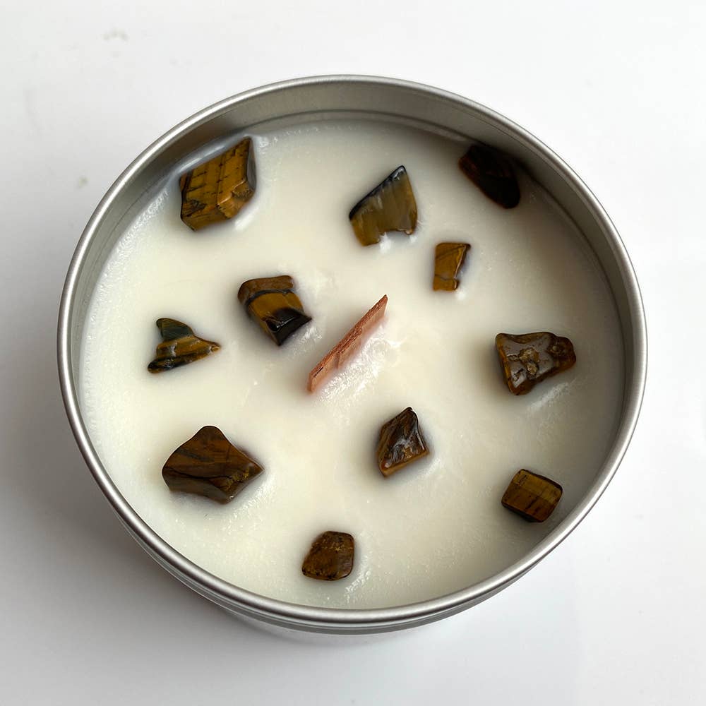 Close up of coconut candle wax with tiger's eye gemstone chips