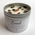 Coconut candle in aluminium tin with tiger's eye crystals and wood wick on white background