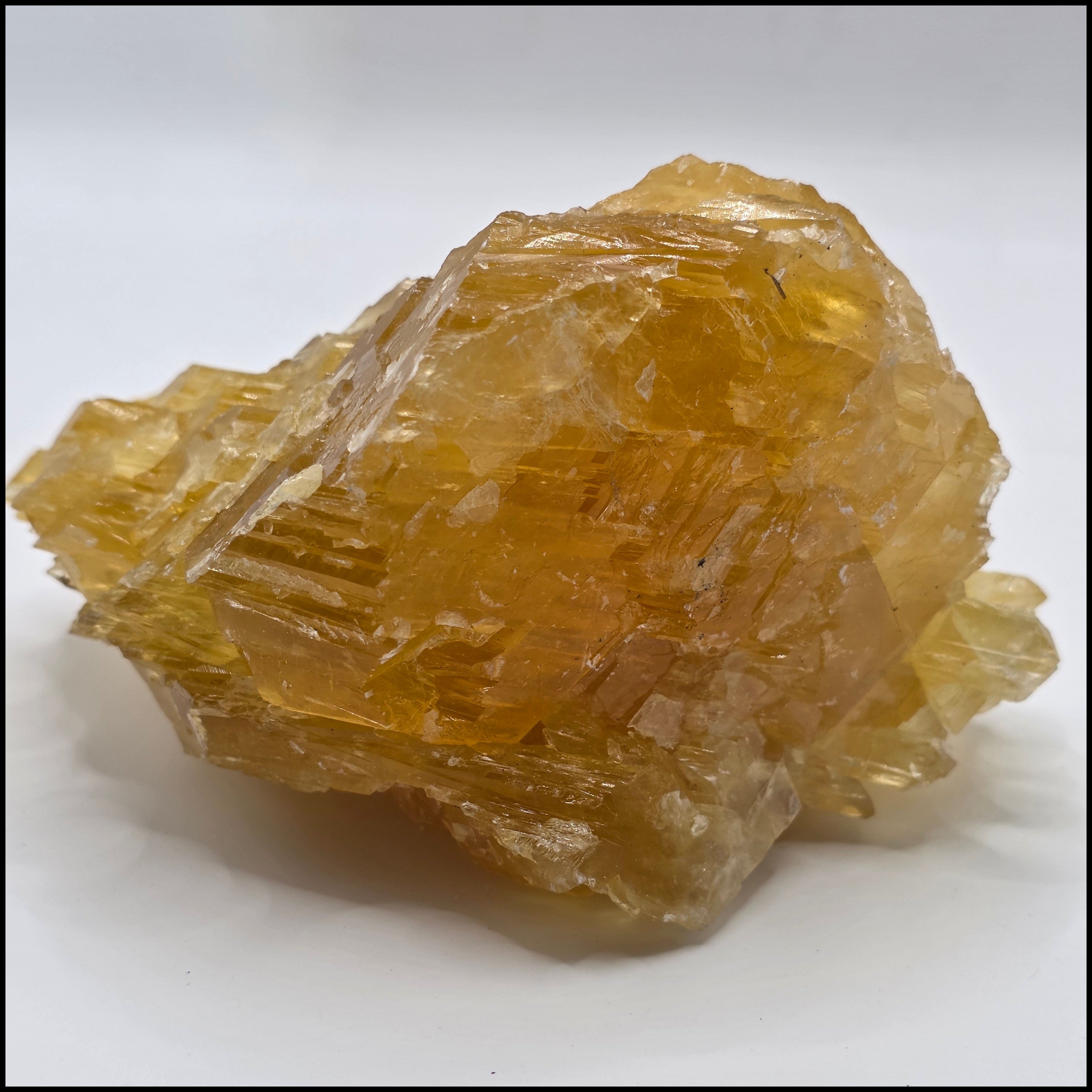 Back of golden calcite 470g showing rich golden-orange colour – natural Afghan calcite