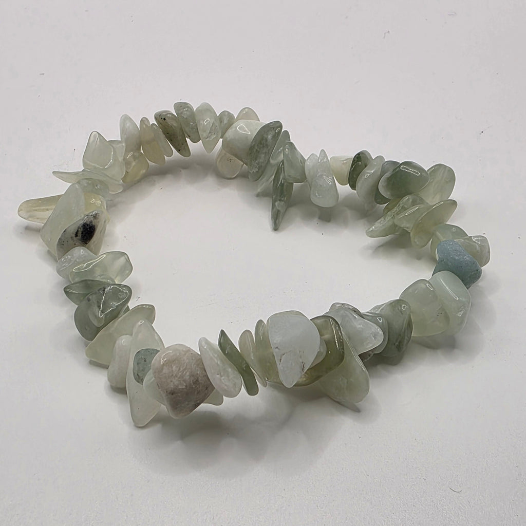 Jade chip bracelet on white background – natural green gemstone chips for good luck and harmony