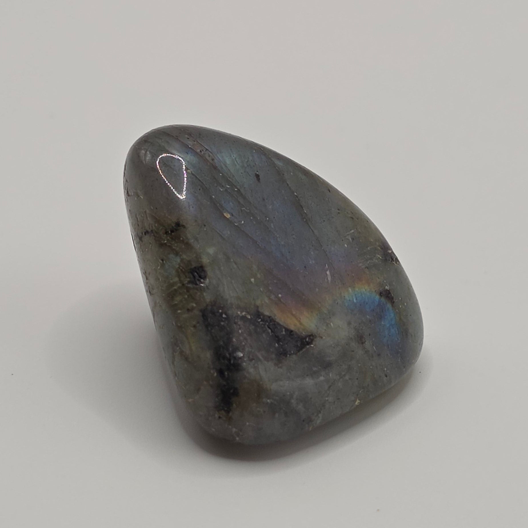 Labradorite tumbled stone on white background – grey stone with blue-green iridescent flash – 2-3cm polished crystal for transformation