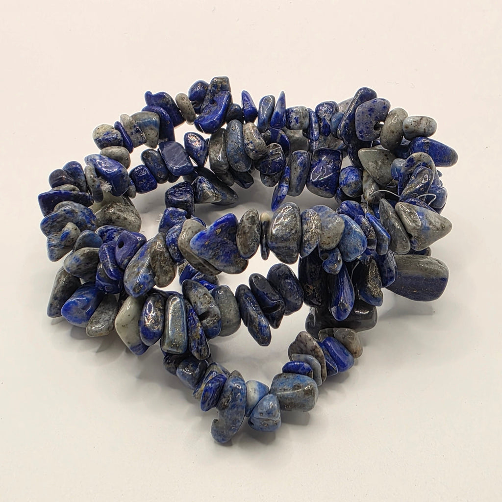 3 Lapis lazuli chip bracelets on white background – natural blue gemstone chips with golden pyrite flecks