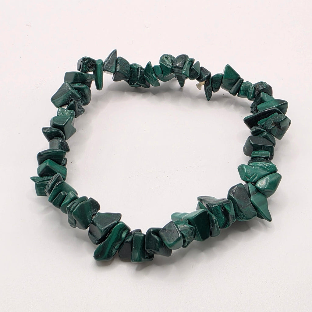 Malachite chip bracelet on white background – natural green gemstone chips with rich banding and swirls