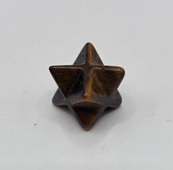 Mini merkaba star 1-2cm on white background – small sacred geometry crystal carving star tetrahedron