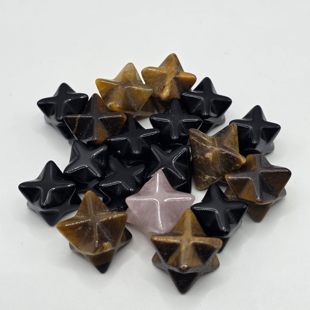 Group of mini merkaba stars in different crystals