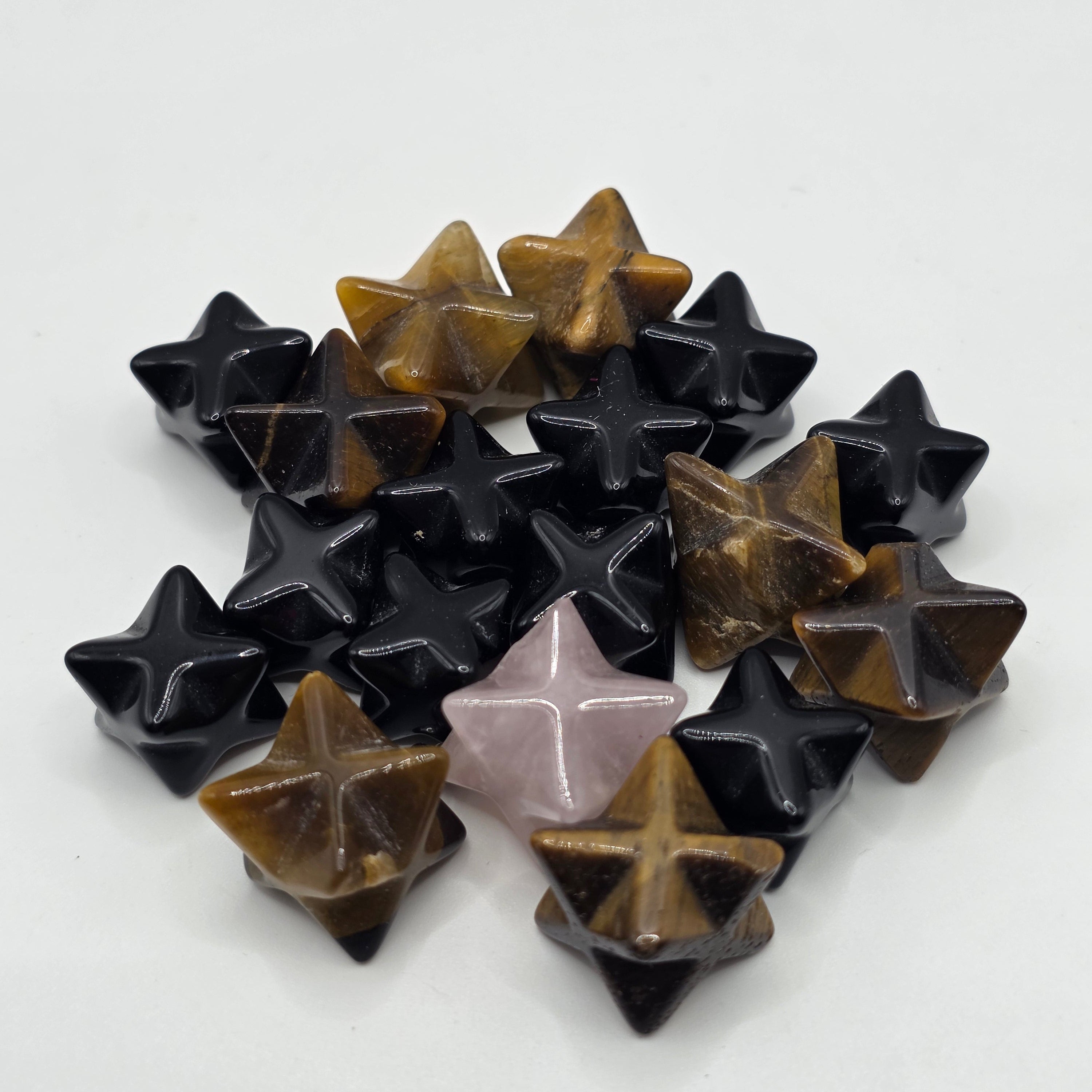 Group of mini merkaba stars in different crystals