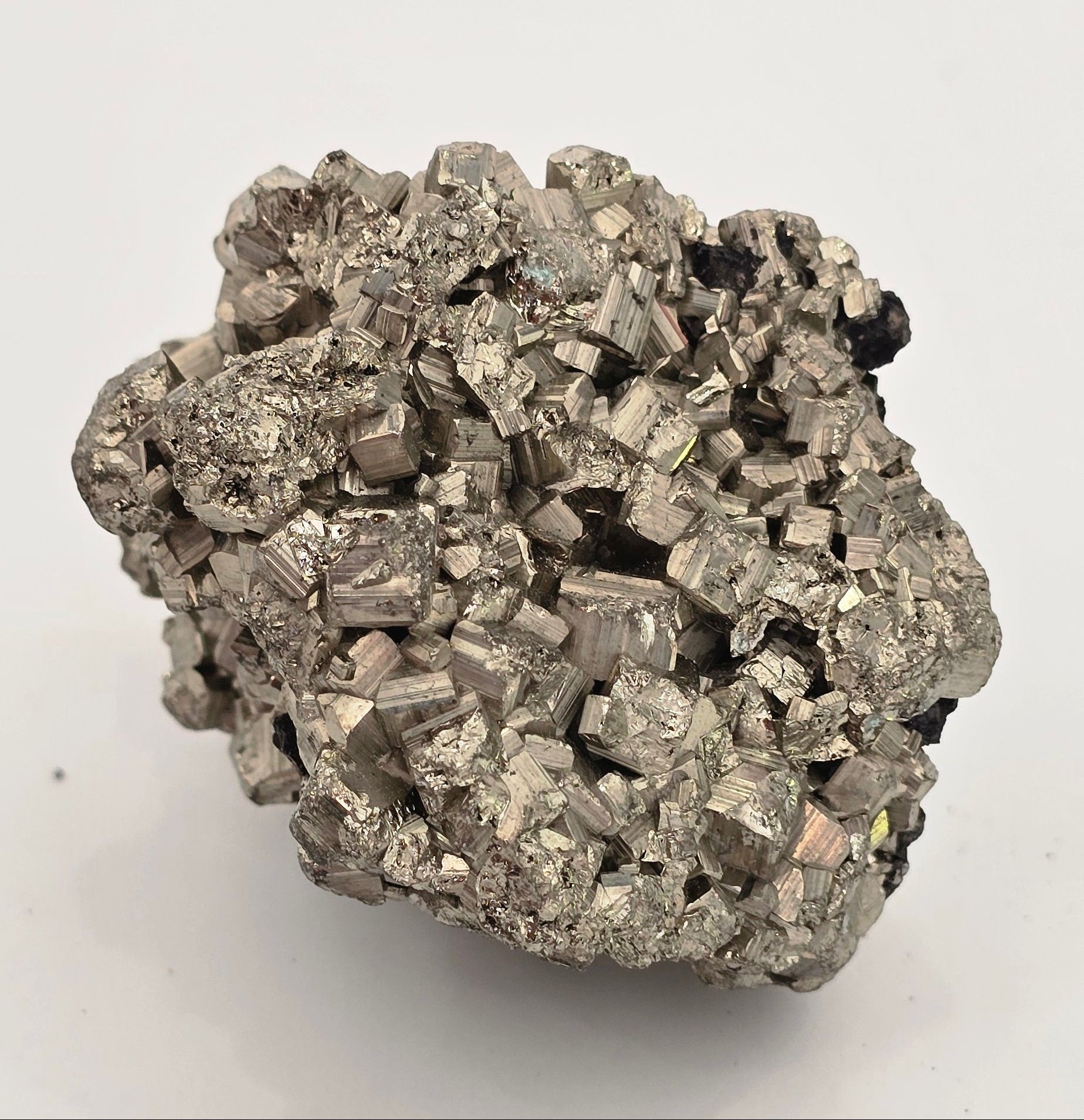 Natural pyrite chispa cluster weighing 225 grams showing metallic gold-silver cubic crystal formations on white background