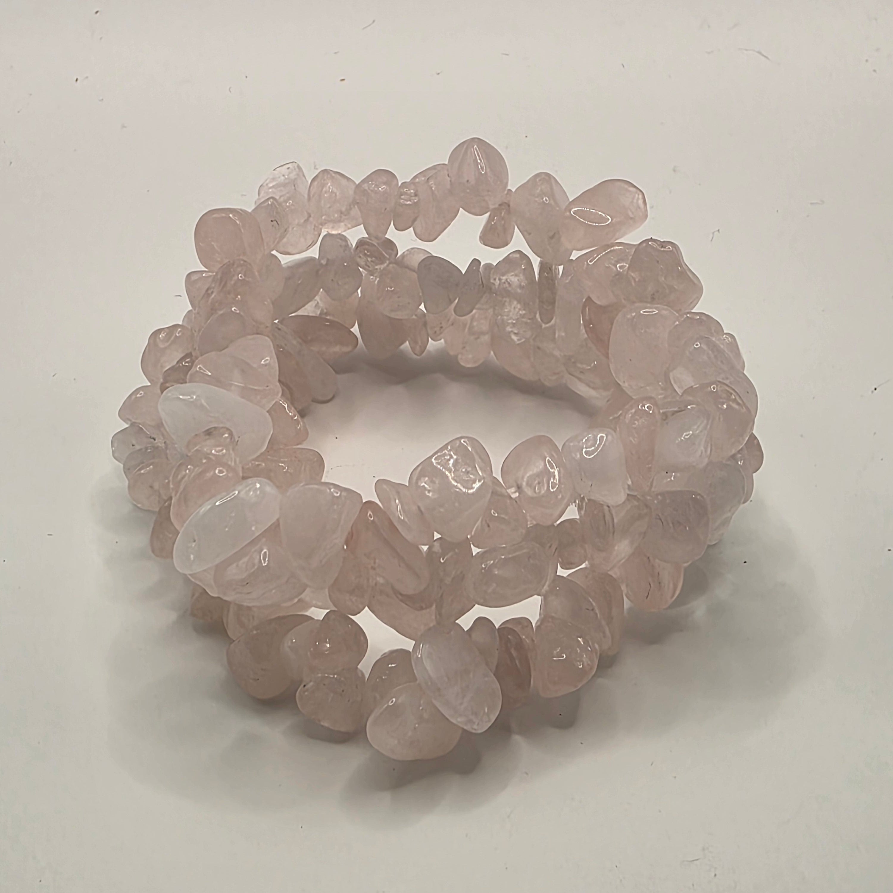 3 Rose quartz chip bracelets on white background – natural pink gemstone chips for self-love and heart healing