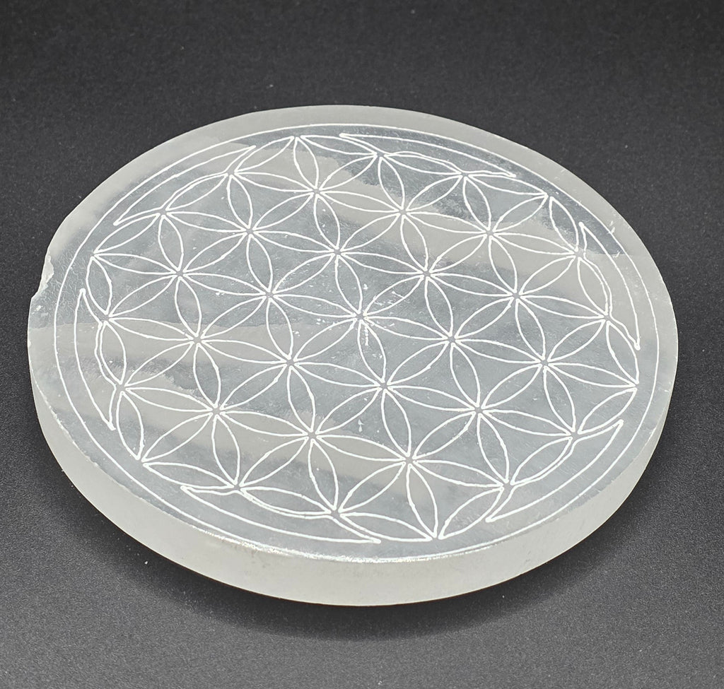 Selenite charging plate with Flower of Life engraving on white background – 10cm selenite plate for crystal cleansing and recharging