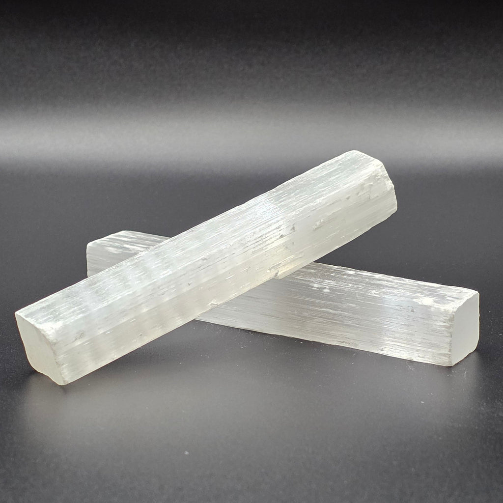Natural selenite wands 10cm on black background – white healing crystal wand for cleansing and energy clearing