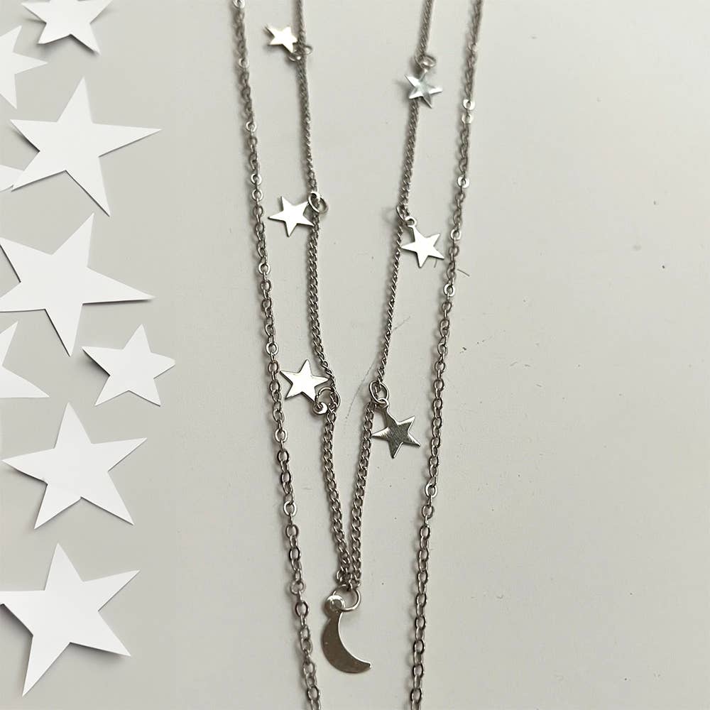 Silver necklace with star pendants on a white background